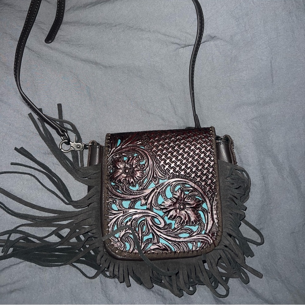 Teal and brown fringe purse.